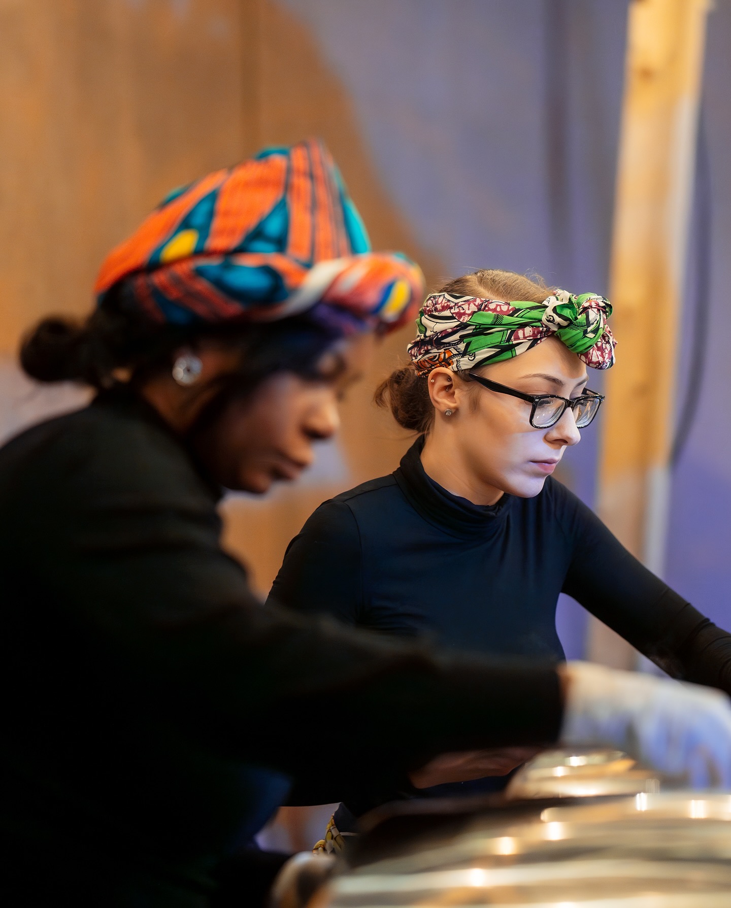 The Deluxe Manna team preparing food in the kitchen